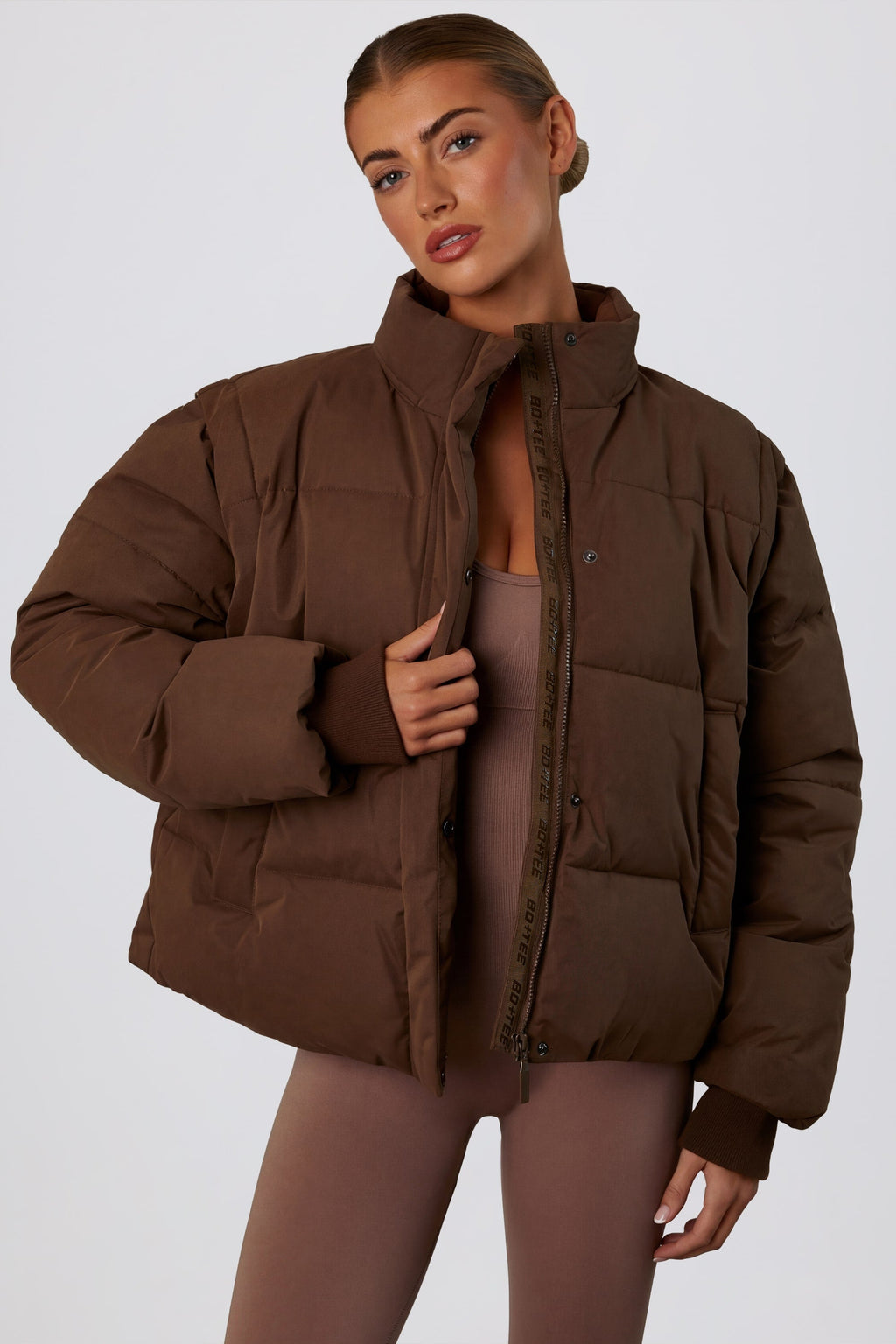 Cropped Puffer Jacket With Detachable Sleeves In Cocoa Brown
